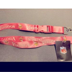 MN Vikings lanyard. 2 feet(?) Baby pink and white with the Vikings logo head